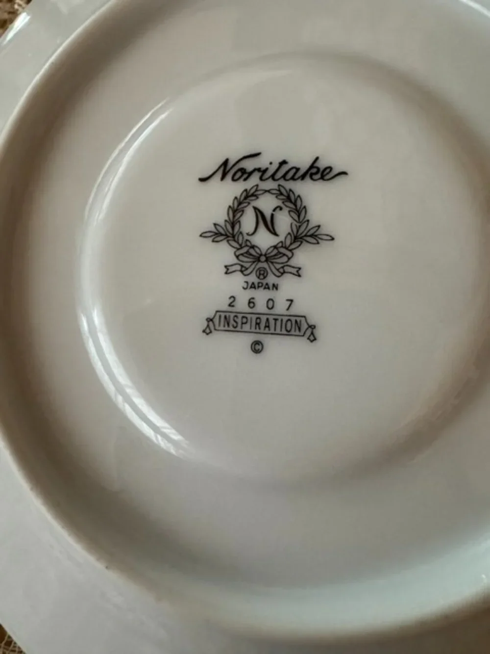 Vintage Noritake porcelain saucer in the 